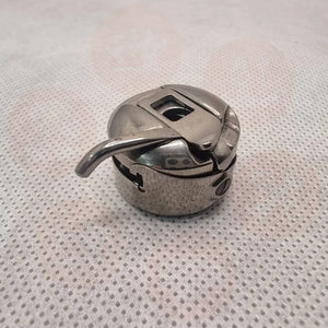 B18289800Ab = Bclk(J3) Bobbin Case Juki Lk1850 Genuine Domestic Parts