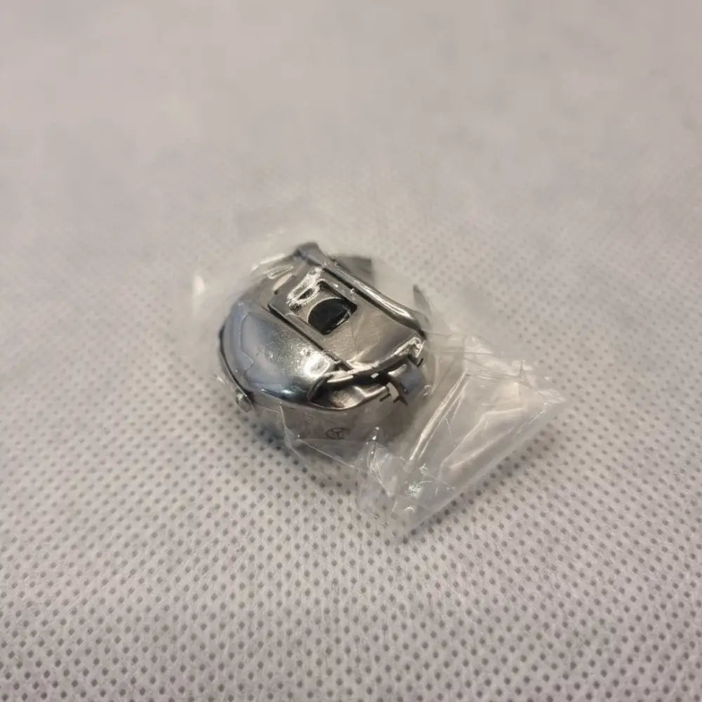 Bchr5Nbl9 - Pr600 = Xc7206001 Bobbin Case Towa Industrial Parts